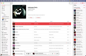 A Halloween-themed playlist is displayed on a music streaming app, showing various songs and albums.