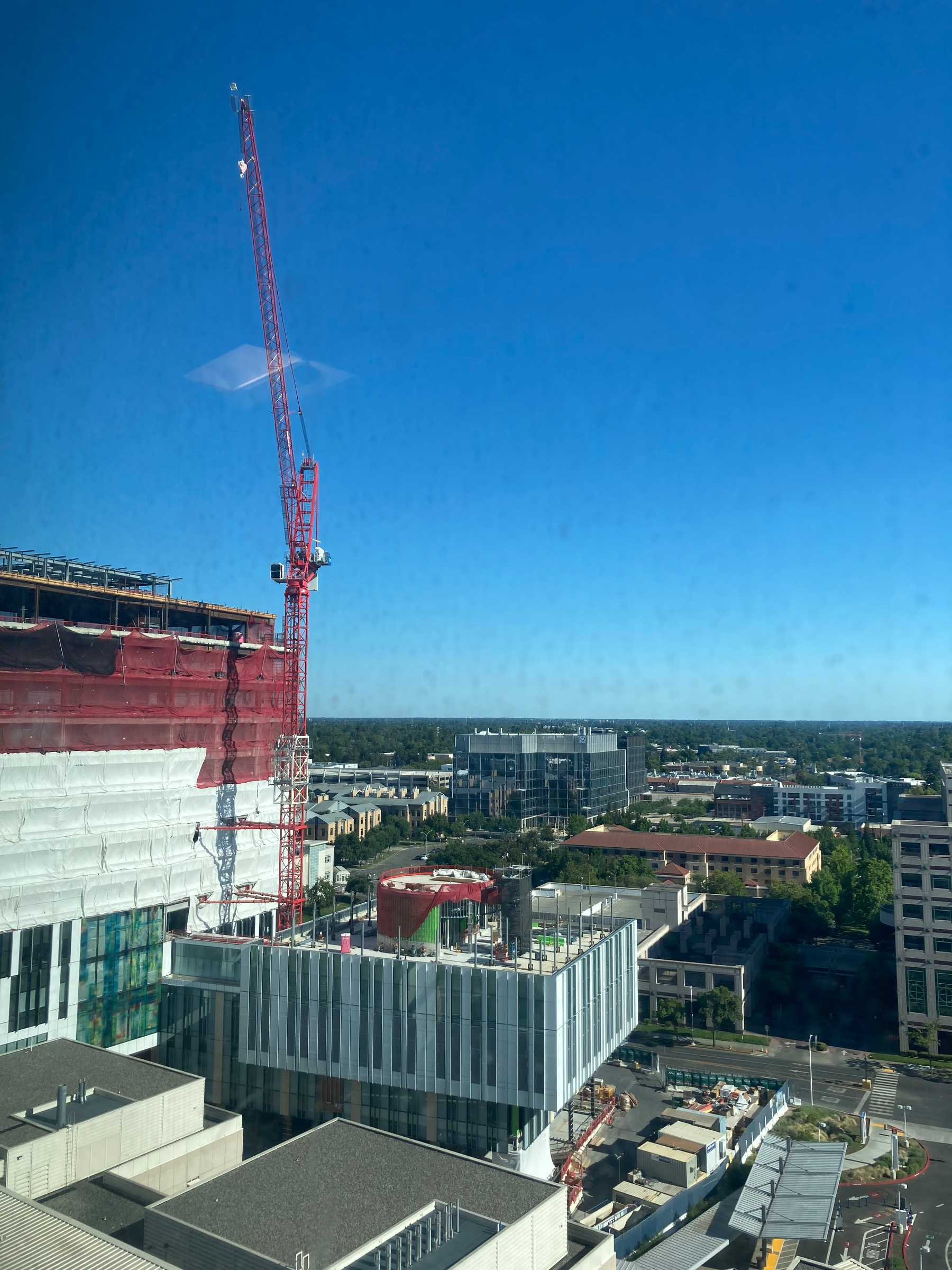 A building with a crane. 
