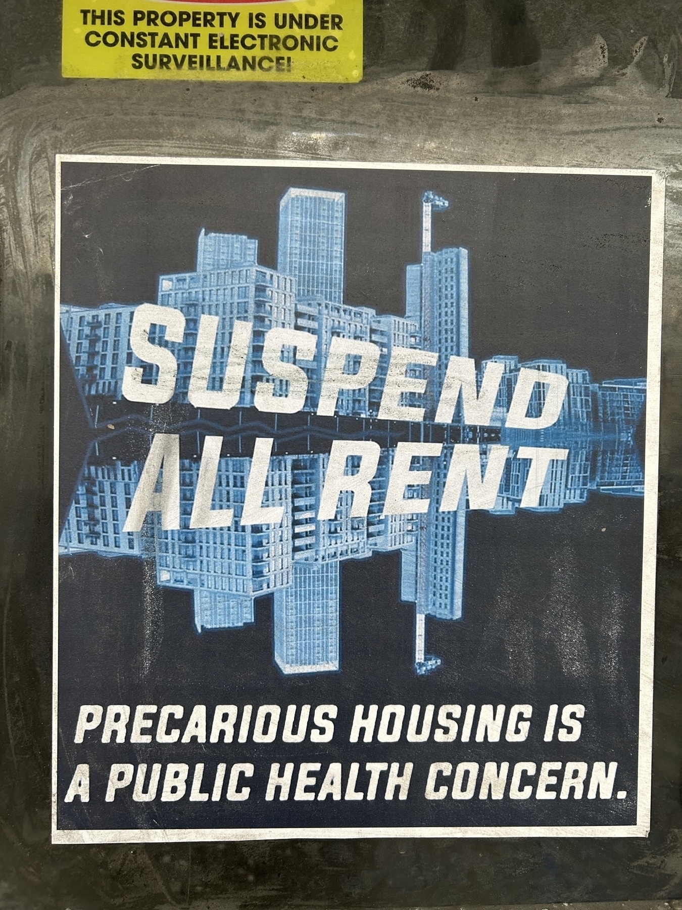 Paste-up that says&10;SUSPEND ALL RENT&10;PRECARIOUS HOUSING IS A PUBLIC HEALTH CONCERN.