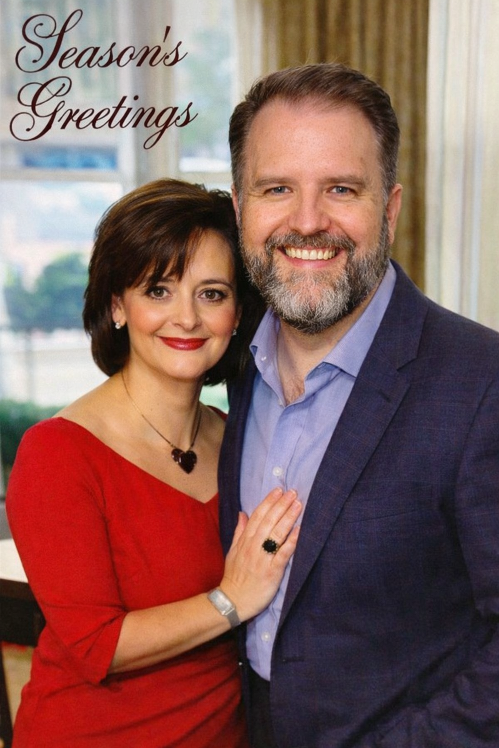 A smiling couple stands together in front of a window with Season's Greetings written in the upper left corner. It’s the AI slop version of Cherie Blair and me. 