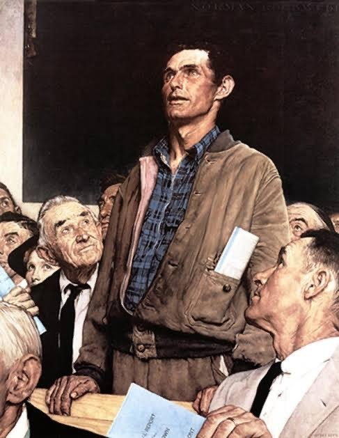 A youngish man in a brown jacket stands confidently in a crowd of seated older men who are attentively looking at him. Well known meme format. 