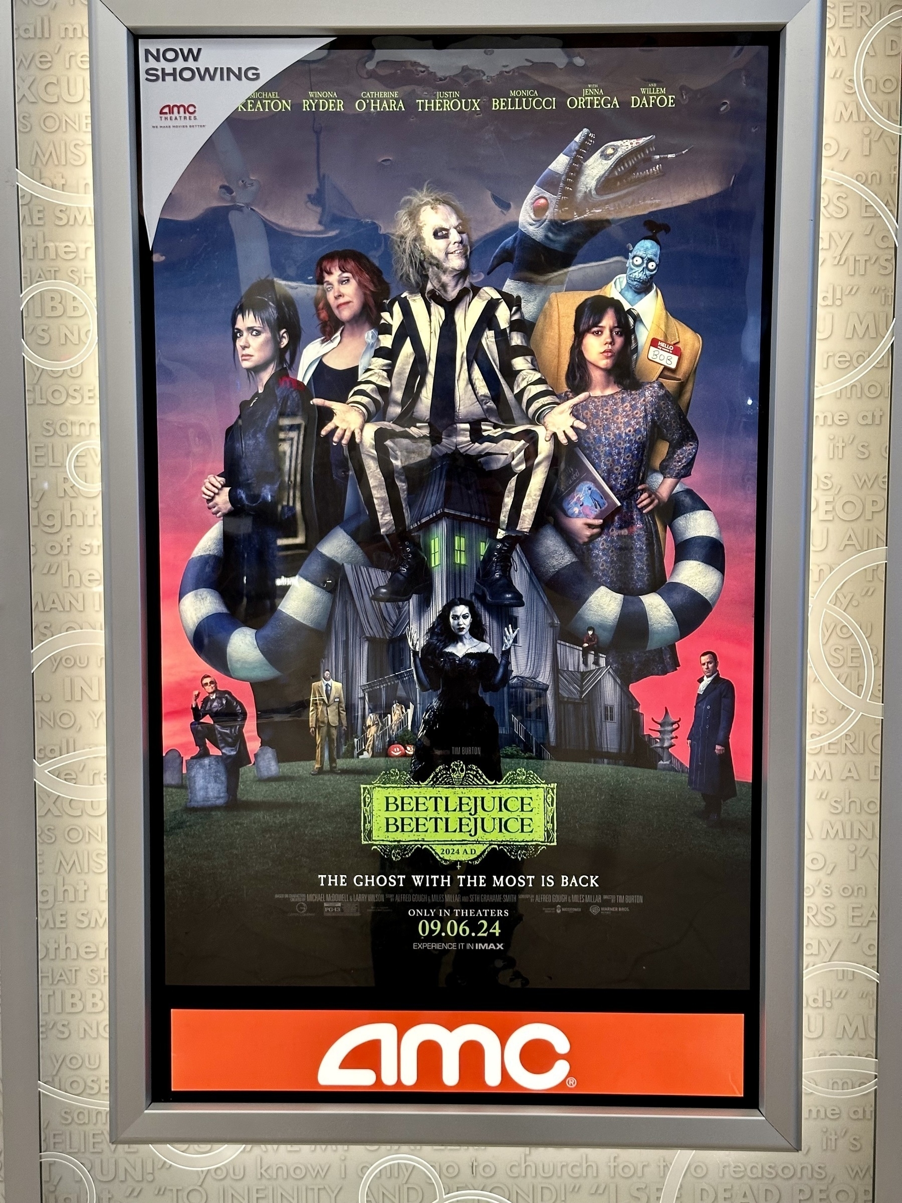 A poster for the film Beetlejuice Beetlejuice, as hanging in an AMC Theatre. 