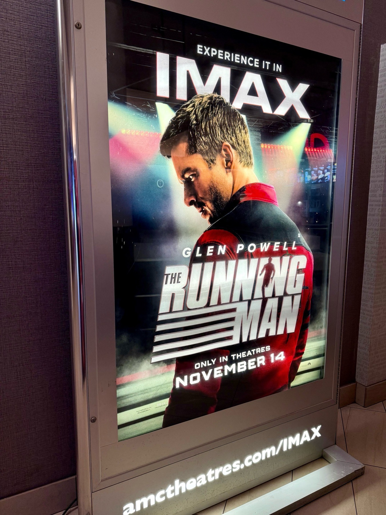 The IMAX poster for Edgar Wright’s The Running Man, starring Glen Powell.
