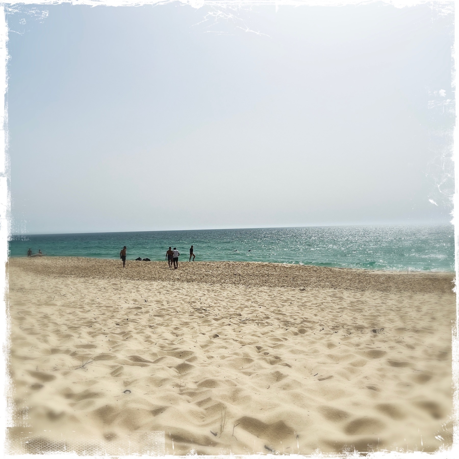 The beach at Comporta, Portugal on a sunny day with a cool wind