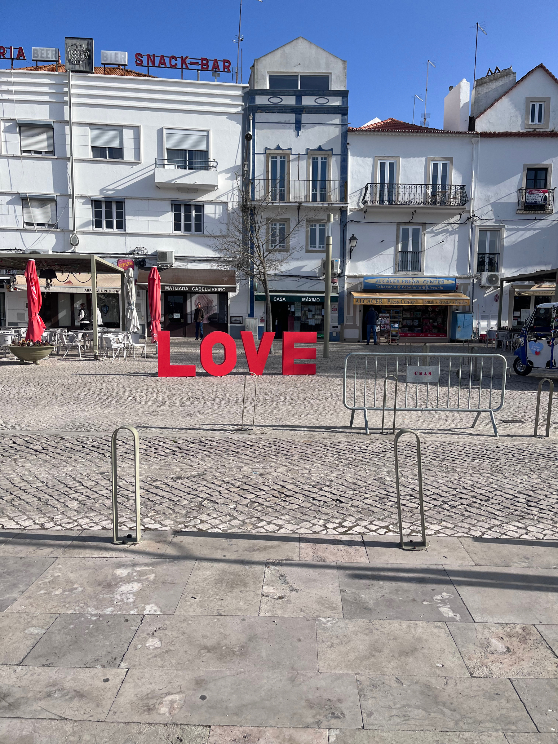 LOVE sign by Alcacer do Sal river front cafes
