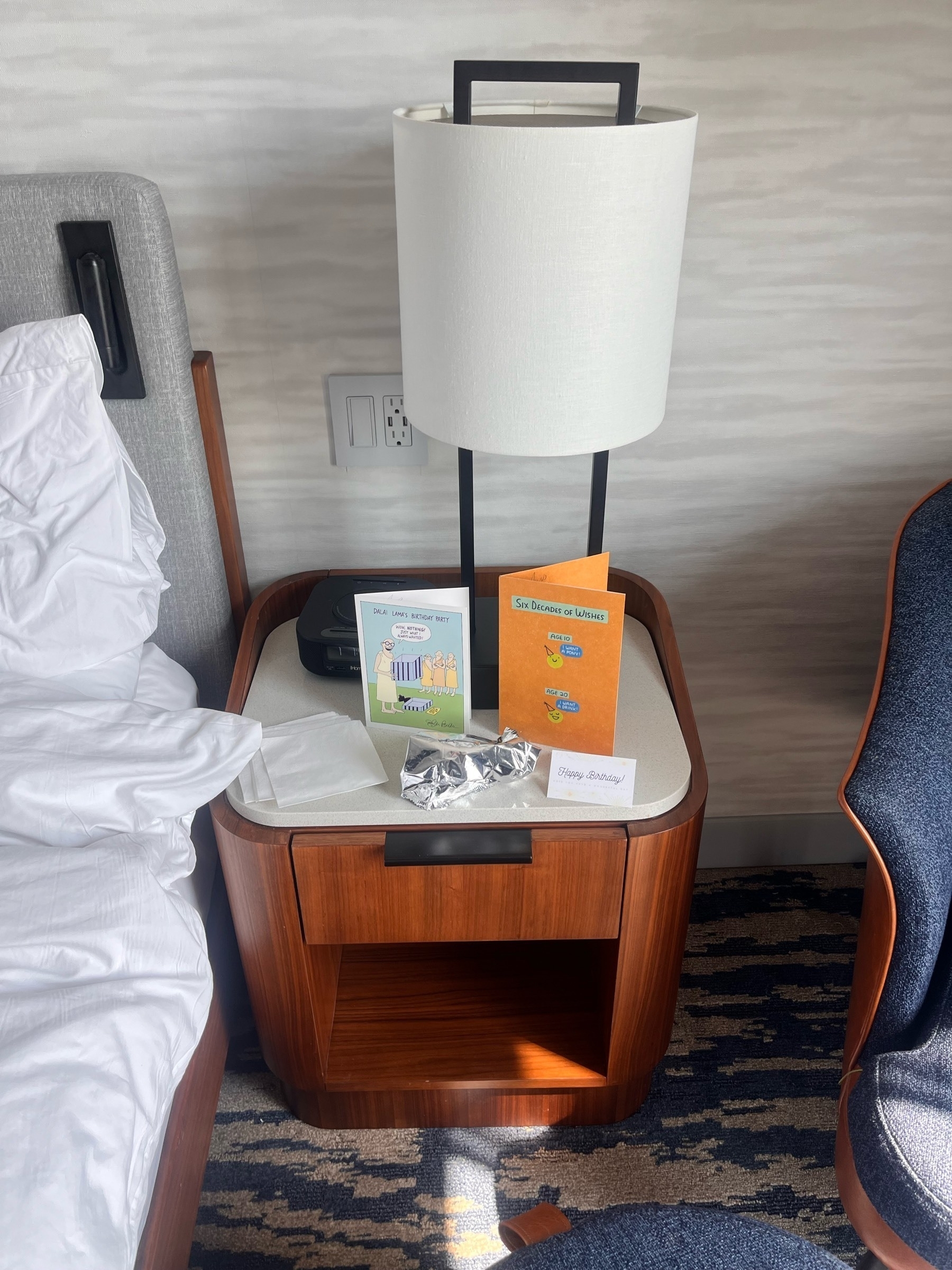 Birthday cards beside my bed at a San Francisco airport hotel
