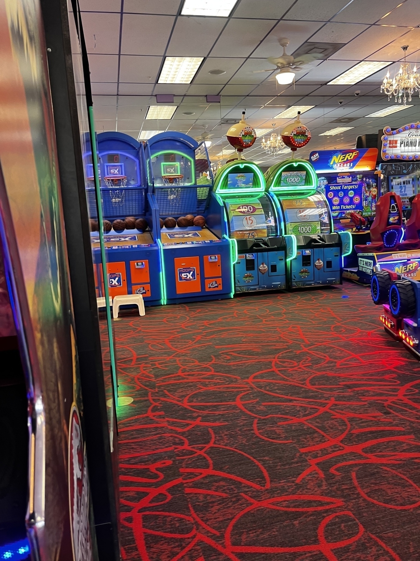 An amusement arcade with a variety of brightly lit games