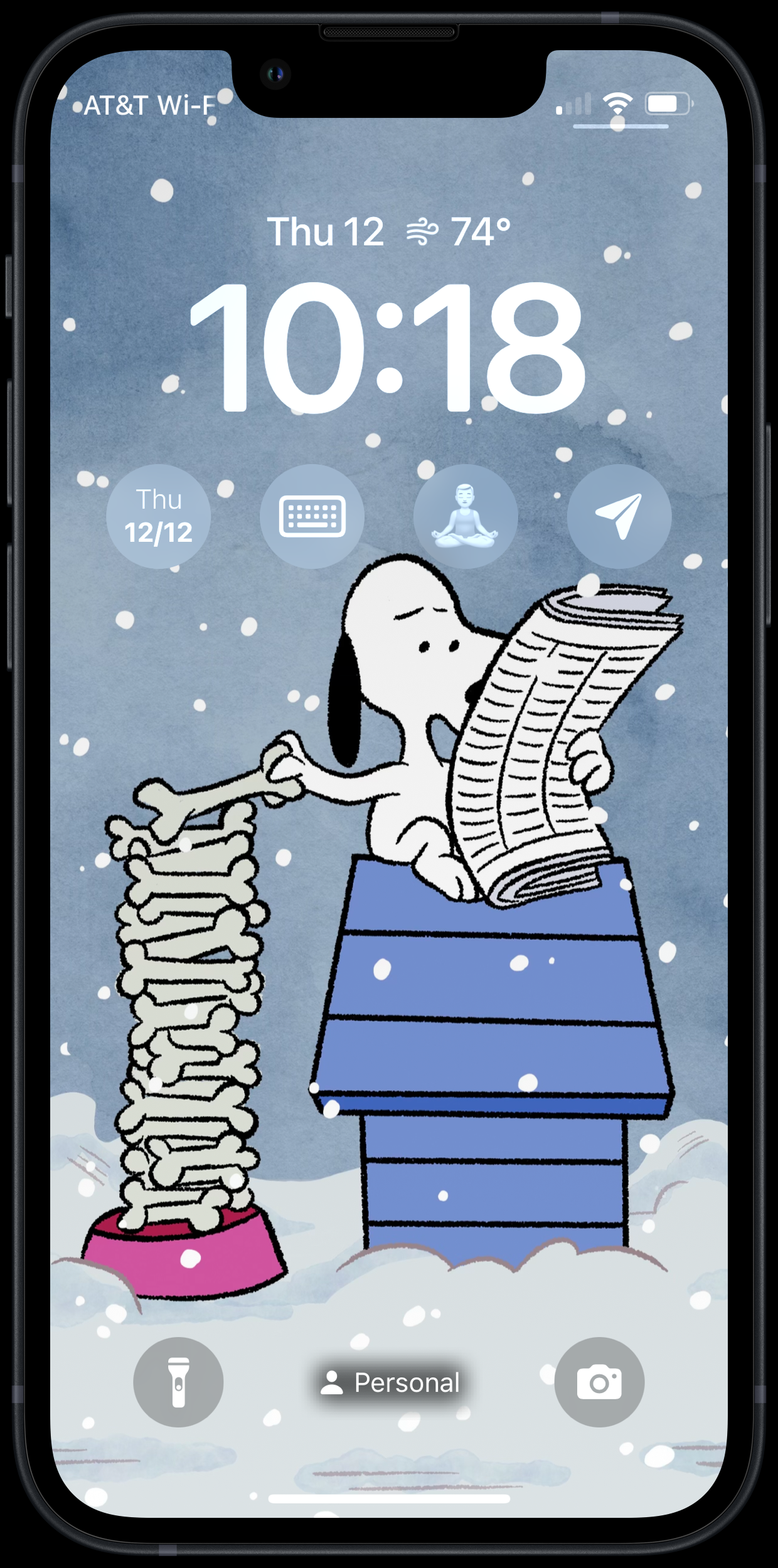 An iPhone Lock Screen showing the Peanuts character Snoopy sitting on a snowy doghouse reading a newspaper, next to a tall stack of bones.