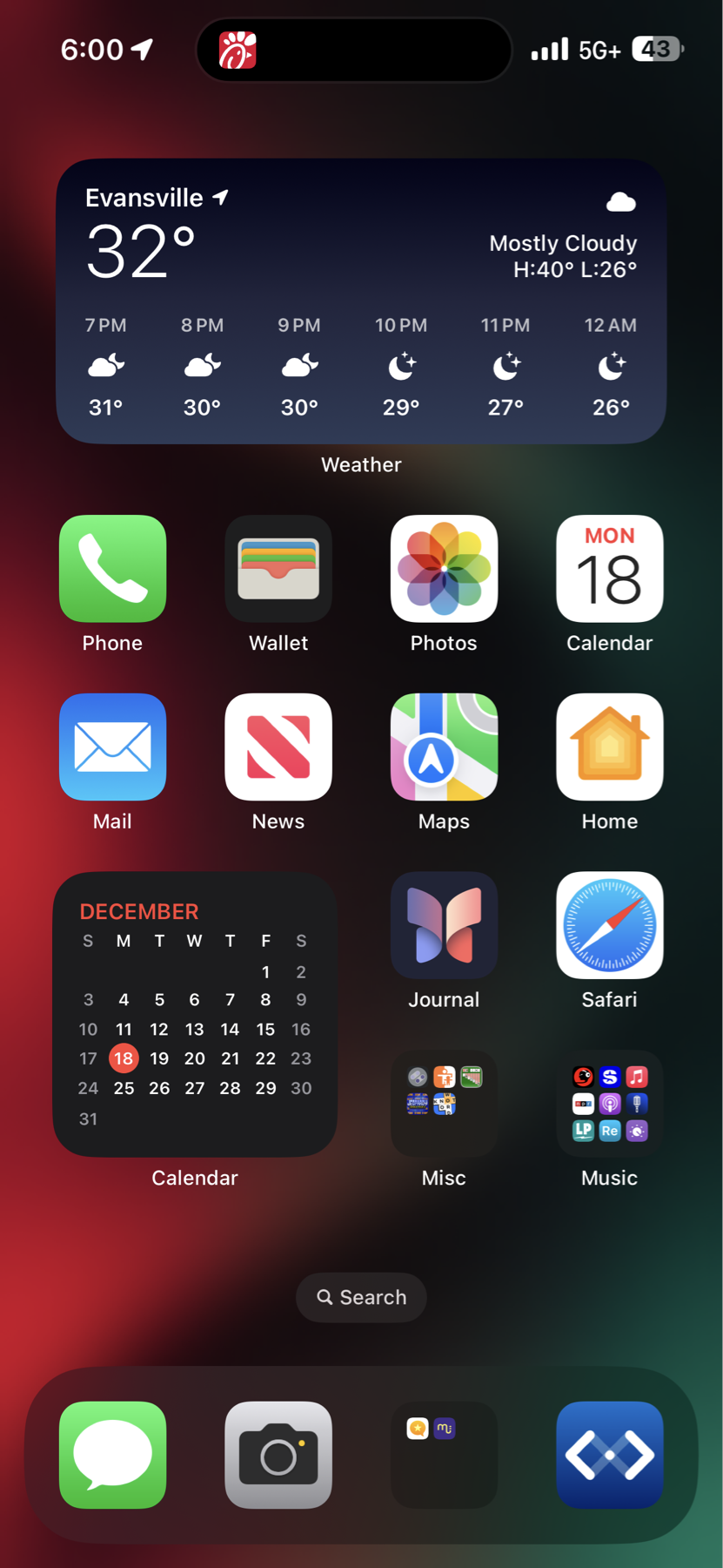 A screenshot of an iPhone home screen displaying various app icons, such as Phone, Wallet, Photos, Calendar, Mail, and Safari, among others. The Weather widget at the top shows the temperature in Evansville as 32°F with a forecast of