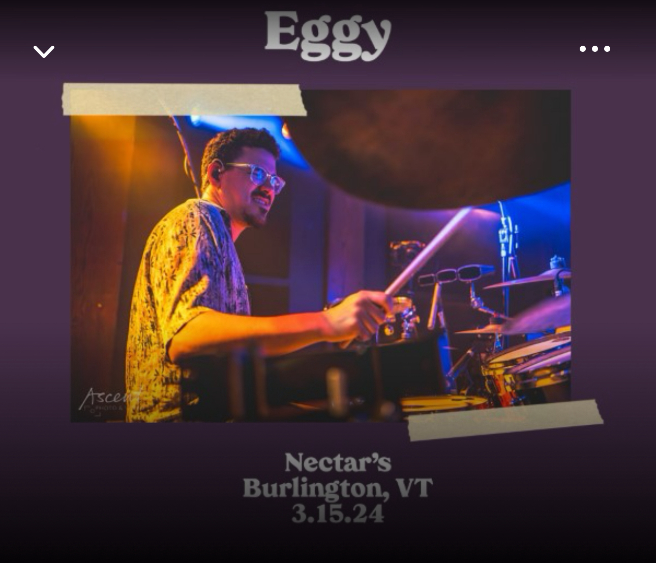 A drummer performing on stage, with the text “Eggy” at the top, and event details stating “Nectar’s Burlington, VT 3.15.24” at the bottom.