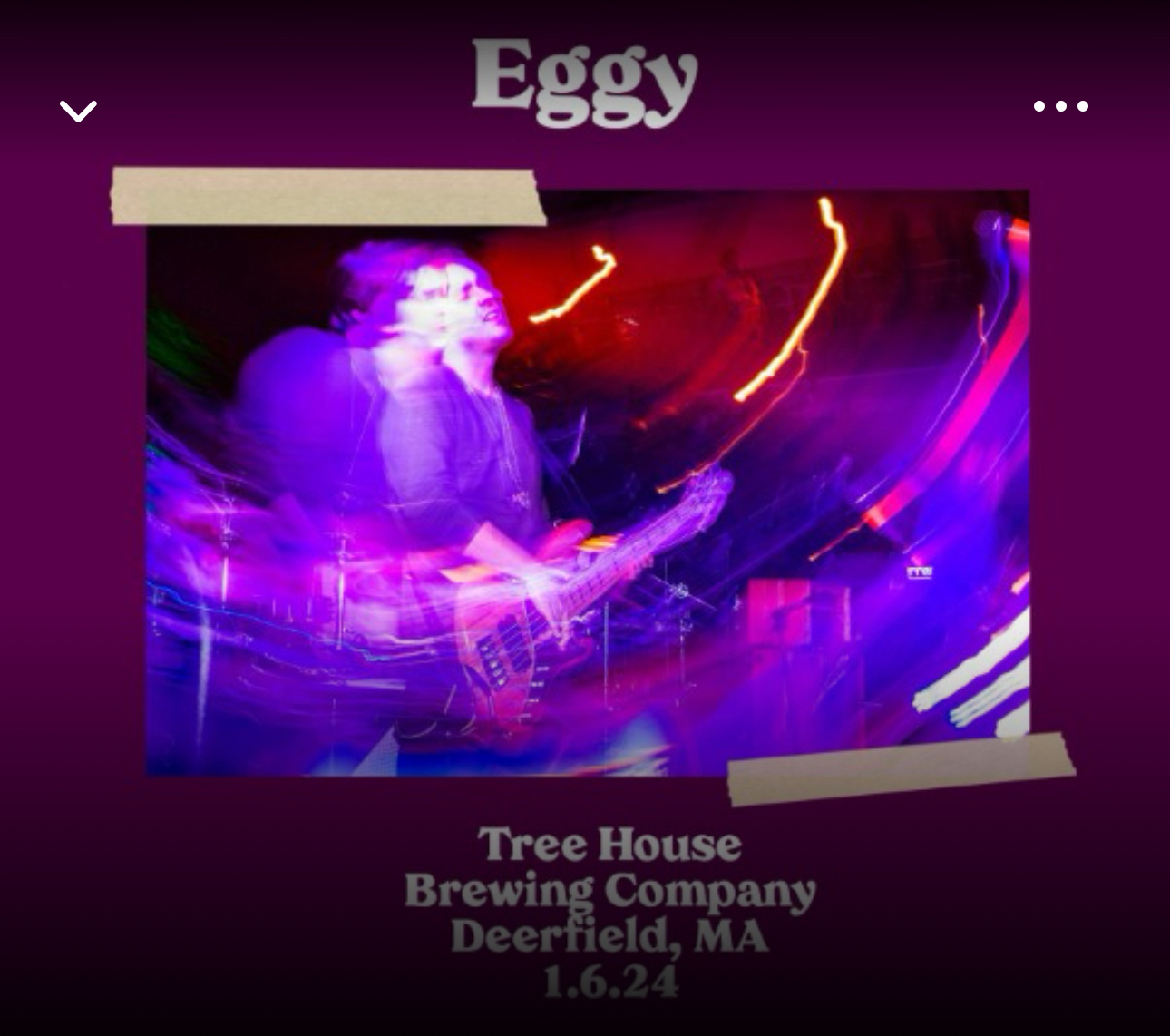 Concert photo of a guitarist on stage with motion blur, against a dark background with light trails. Text overlay indicates “Eggy” at “Tree House Brewing Company, Deerfield, MA, 1.6.24”.