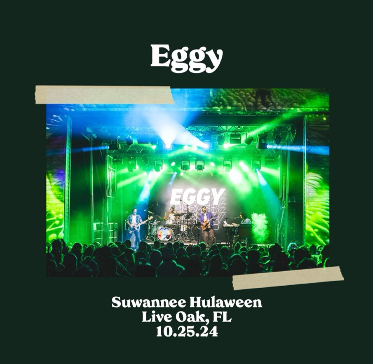 A band named Eggy is performing on stage with vibrant green lights at Suwannee Hulaween in Live Oak, Florida, on October 25, 2024.