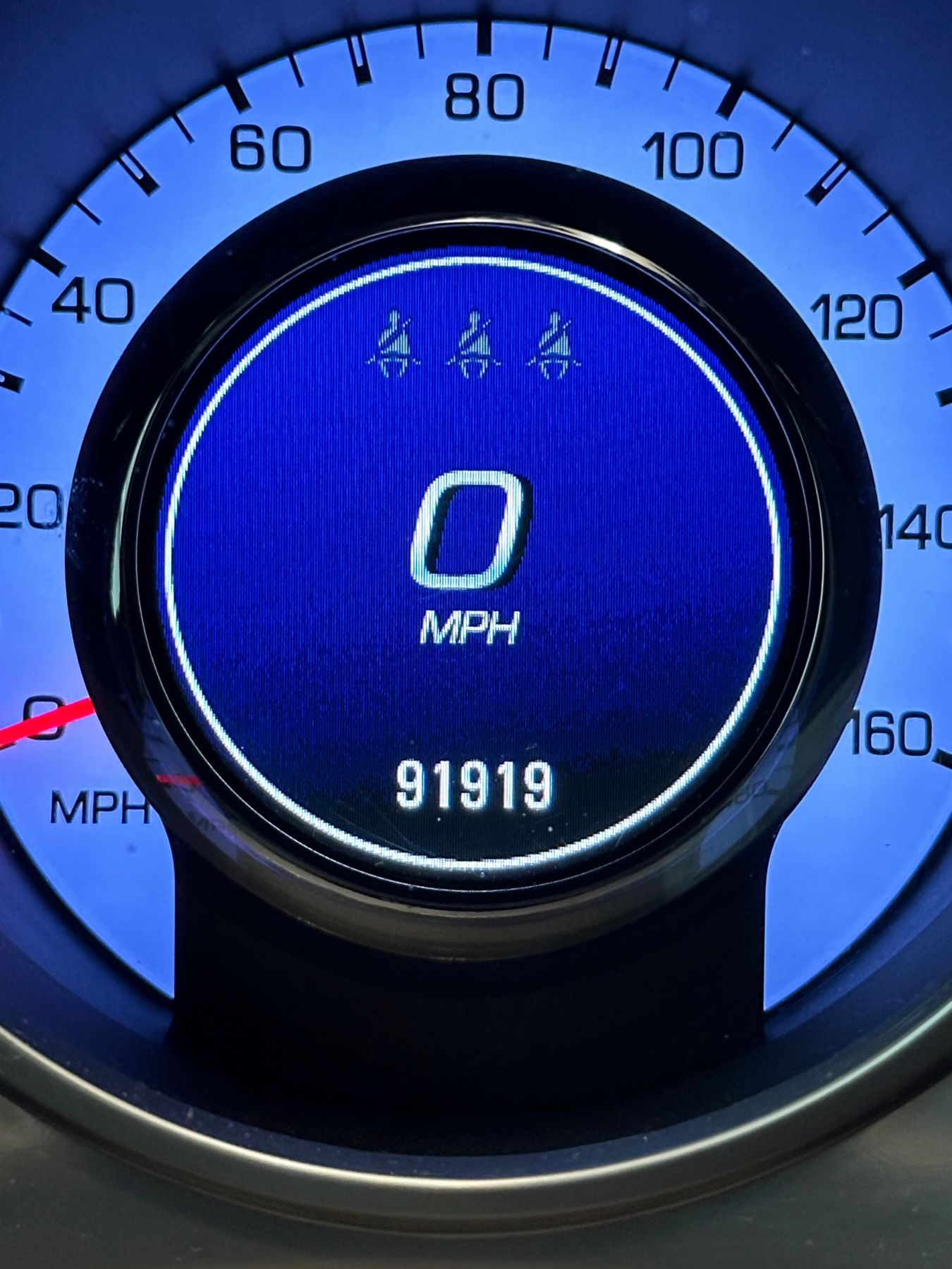 Vehicle speedometer and odometer reading 91,919 miles with a digital display also showing a warning for icy conditions, indicated by three snowflake symbols.