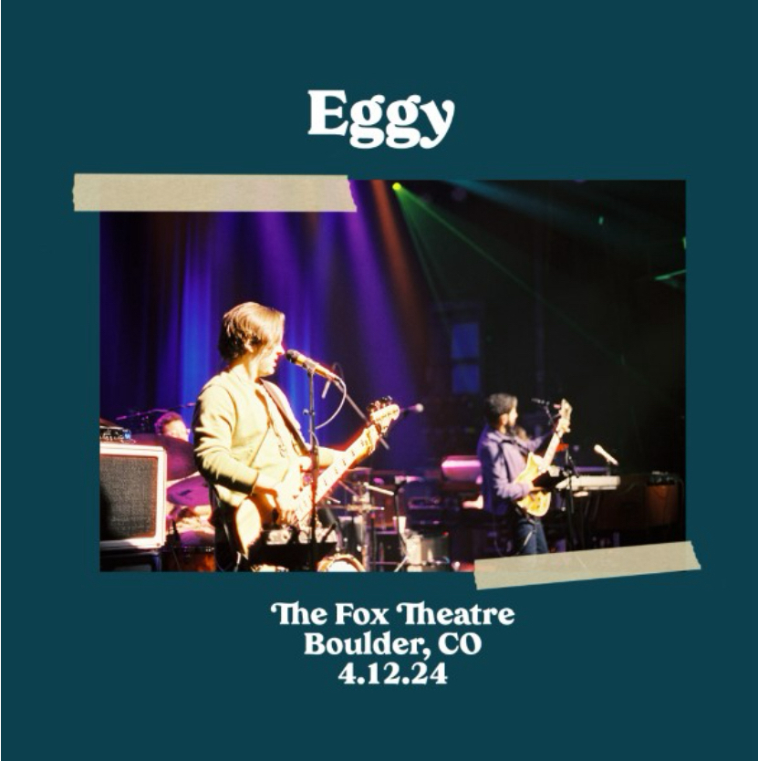 A promotional image for a music performance by a band named Eggy at The Fox Theatre in Boulder, CO, on April 12, 2024. The image shows two musicians on stage with guitars, microphones, and amplifiers, lit by