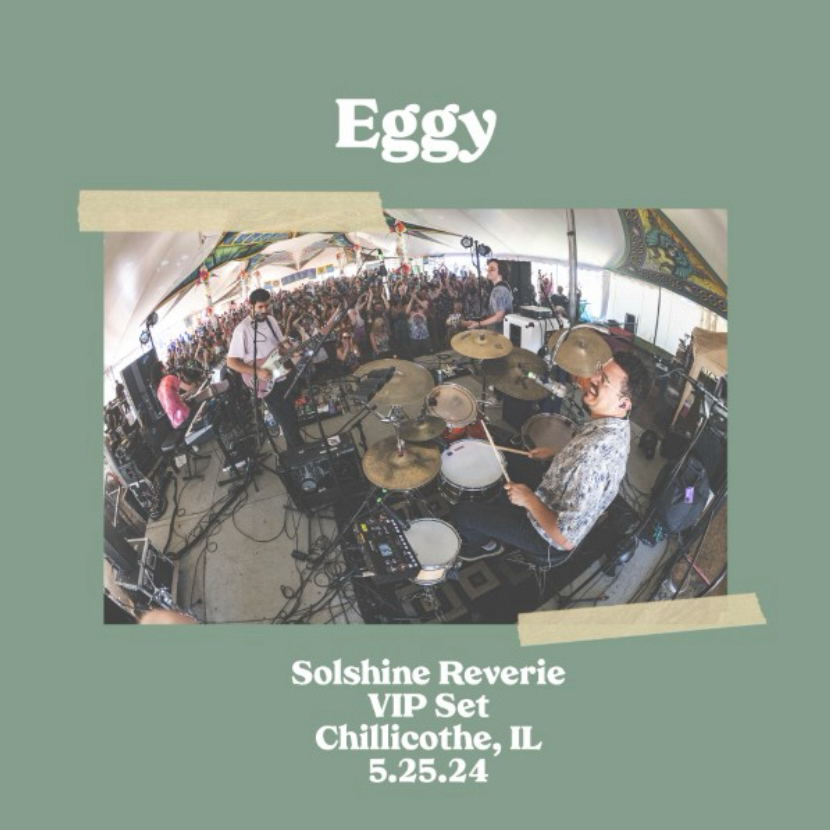 A band named Eggy is performing live on stage at the Solshine Reverie VIP Set in Chillicothe, IL, on 5.25.24. The image shows band members playing instruments and singing to a large, enthusiastic crowd under a