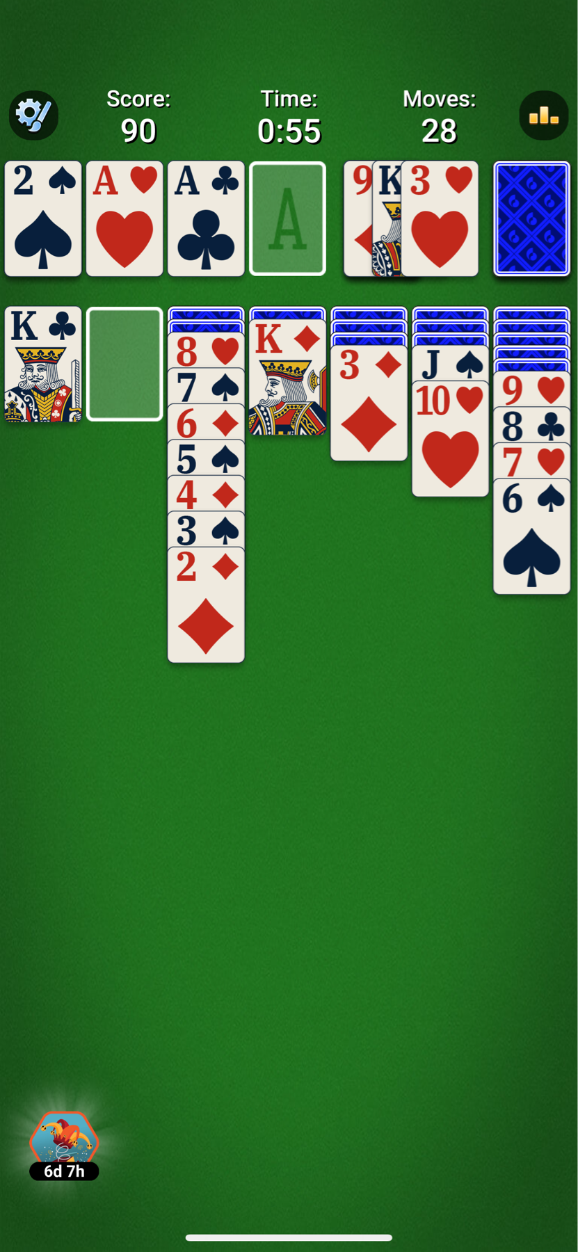 Solitaire card game screen with the score, time, and number of moves displayed at the top. The layout shows seven columns of cards, some face-up and arranged in descending order, and a deck with remaining cards at the top right. Four empty