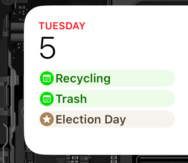 A digital calendar highlights events such as Recycling, Trash, and Election Day on Tuesday the 5th.