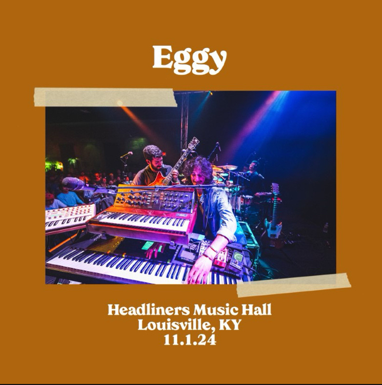 A band performs on stage at Headliners Music Hall in Louisville, KY, with a date set for November 1, 2024, featuring prominently displayed keyboards and vibrant lighting effects.