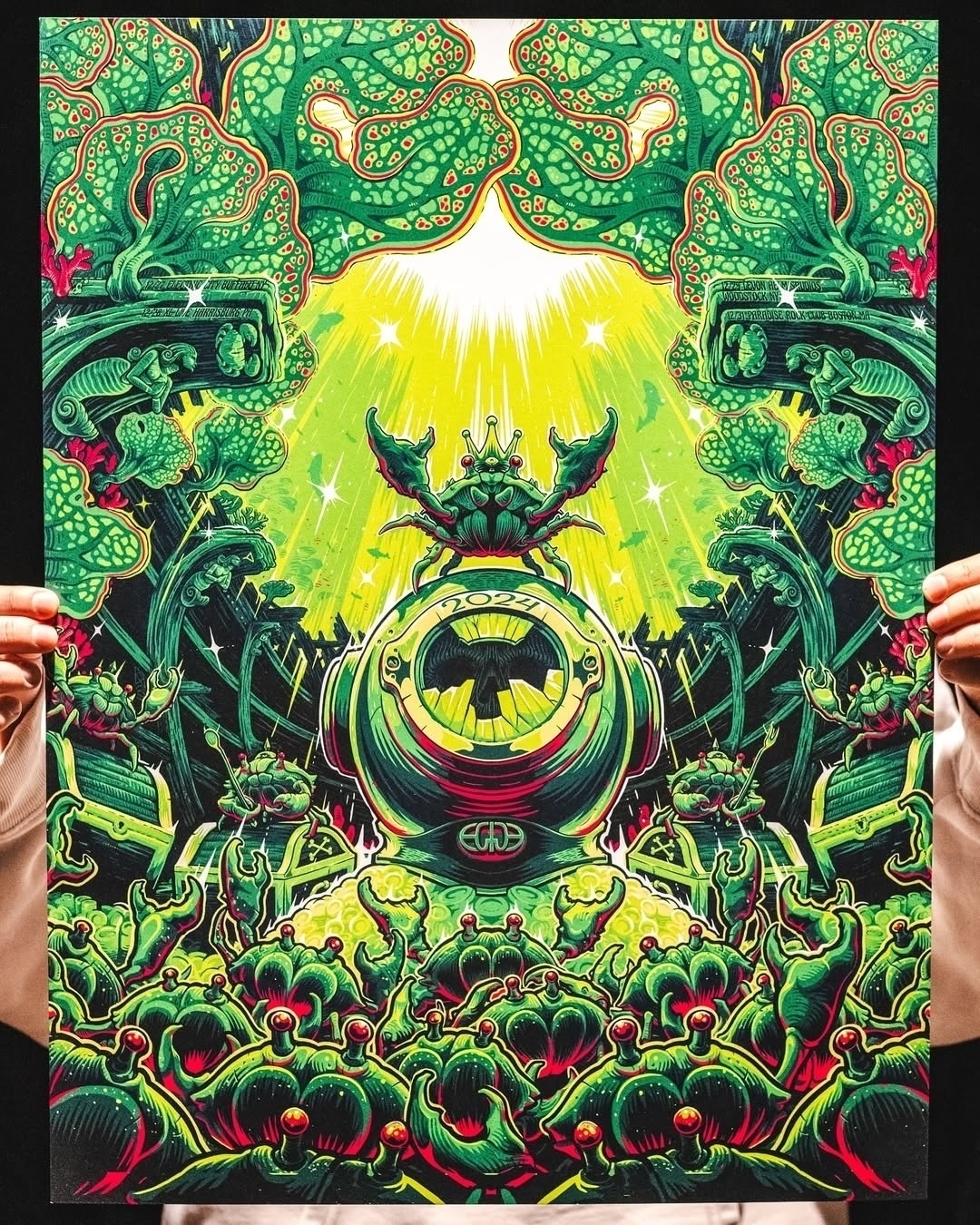 A vibrant and symmetrical fantasy illustration features an abstract jungle scene with lush greenery and intricate shapes, framed by hands holding the artwork.