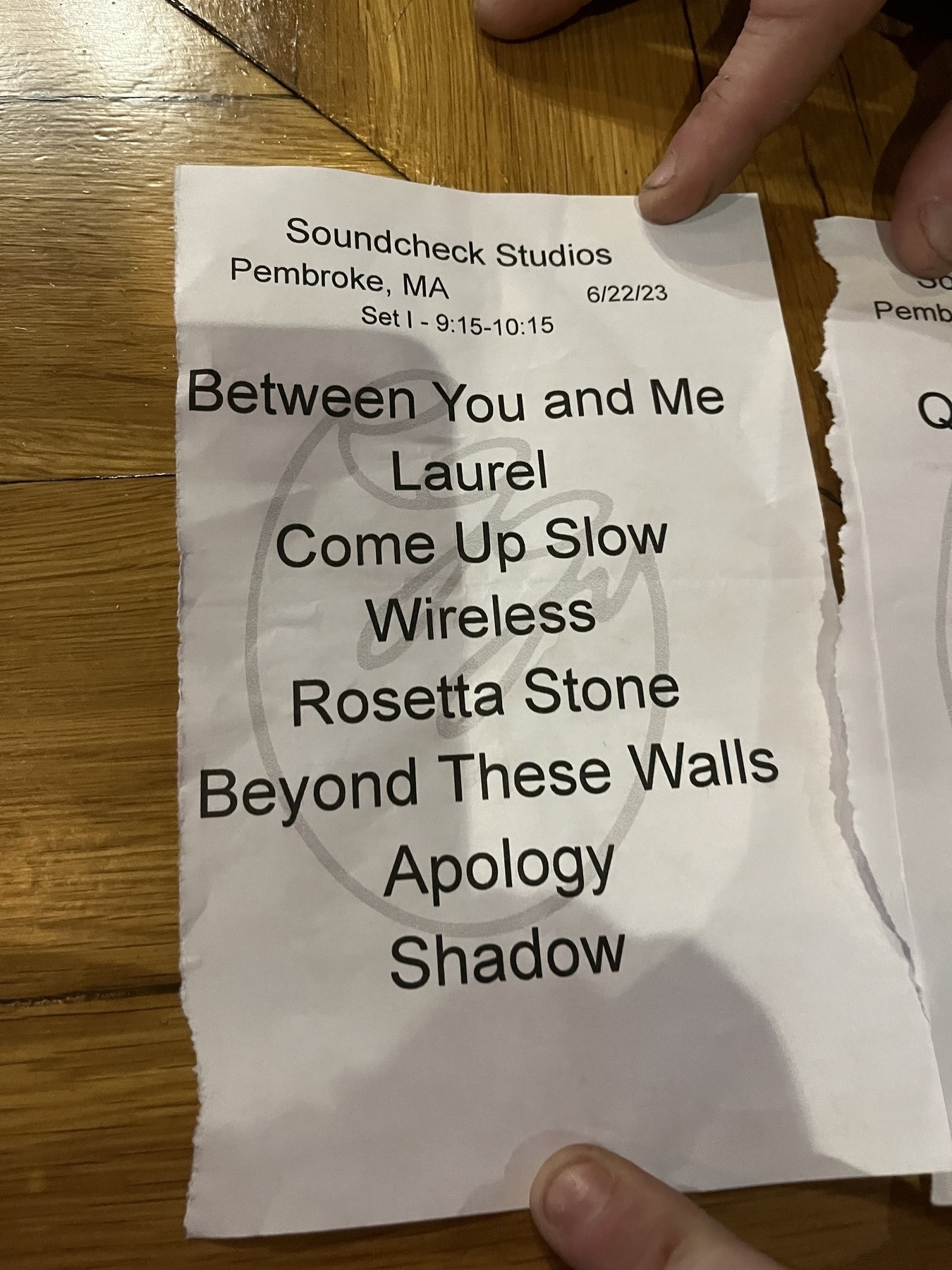 A setlist on paper from Soundcheck Studios in Pembroke, MA, dated 6/22/23, lists songs like "Between You and Me" and "Shadow."