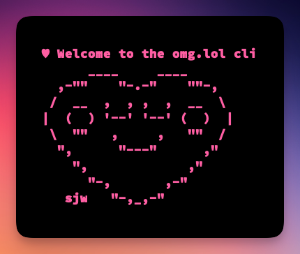 A terminal with a pink heart ASCII image