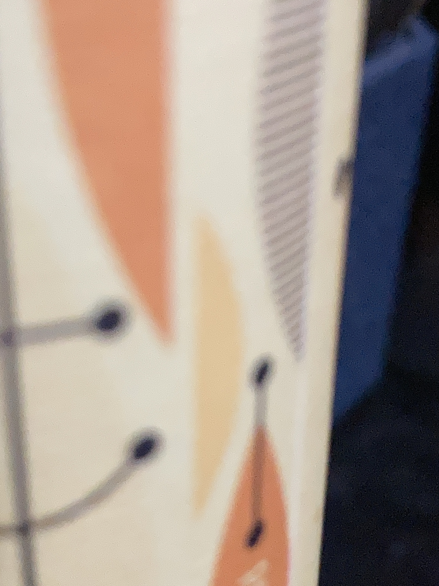 A blurred micro-photo of a Retro 51 pen case. 