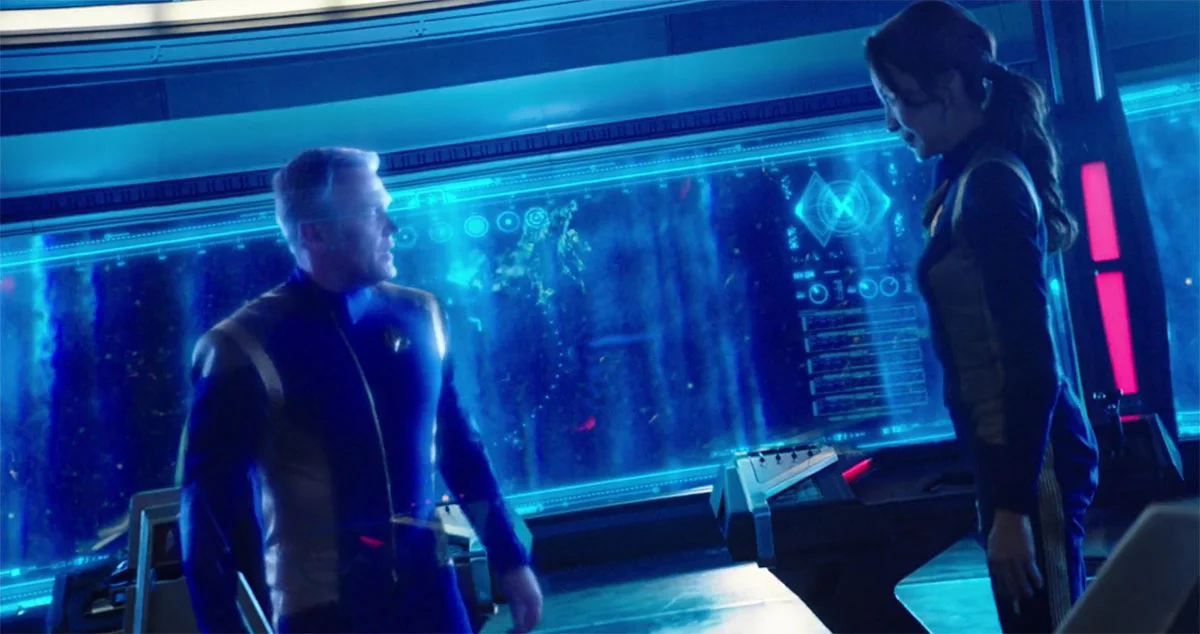 Admiral Hologram appears on the bridge.