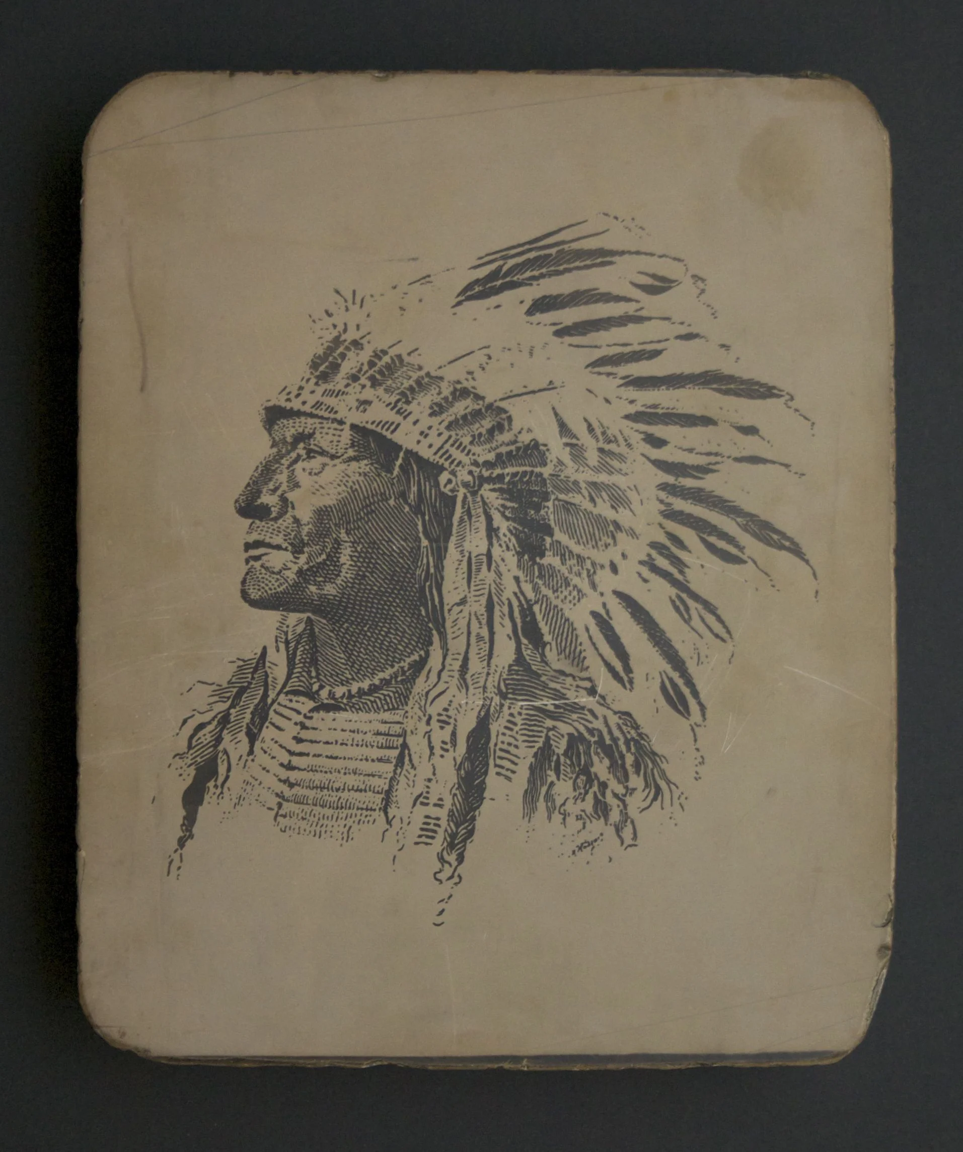 A 100-year-old litho stone. The logo for Carlisle and Co., a San Francisco printer. Note the name of the company in the feathers.