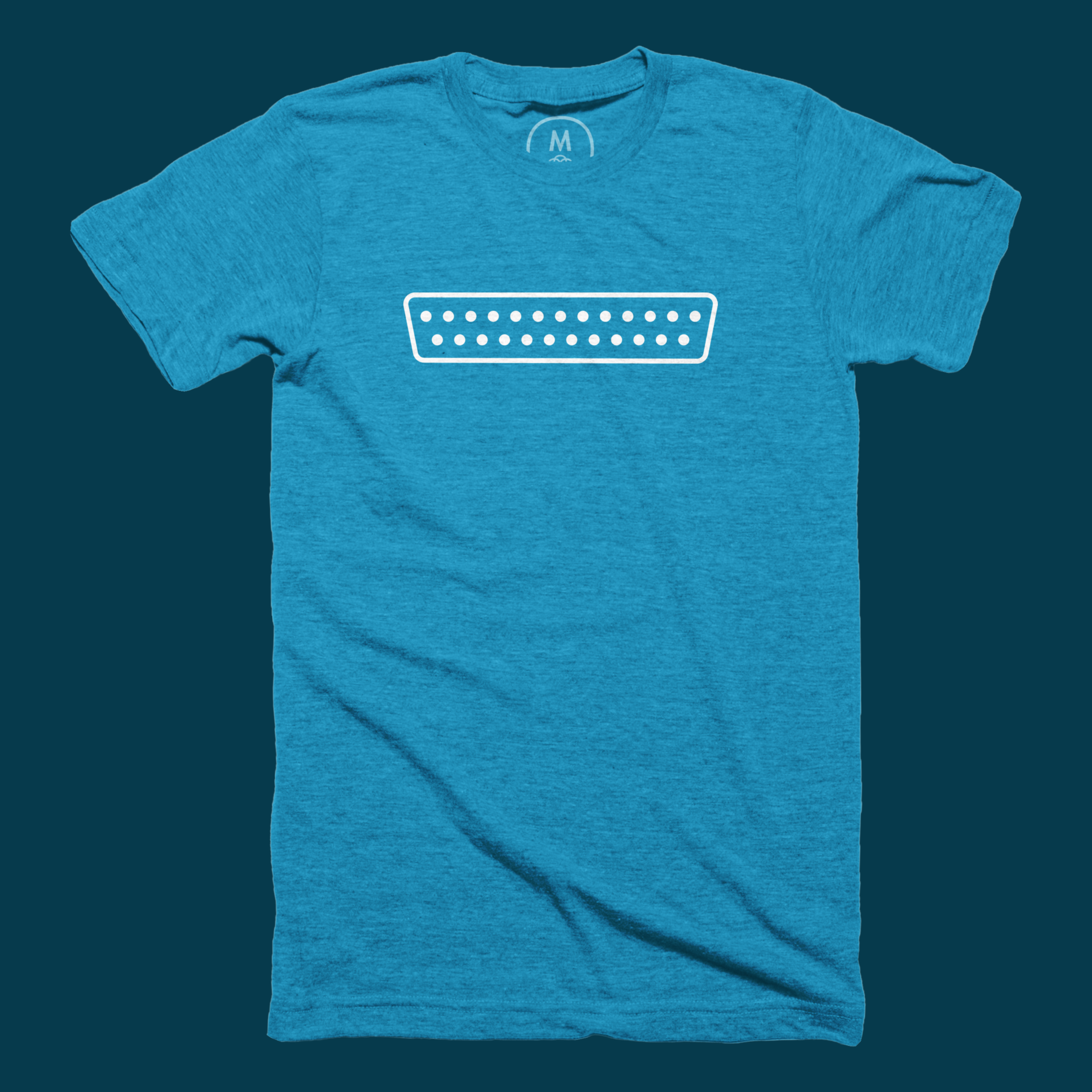 A blue t-shirt features a minimalist white graphic of a vintage SCSI connector port on the front.