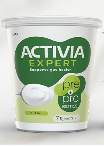 A container of Activia Expert yogurt with prebiotics and probiotics, labeled as plain and containing 7g of protein.