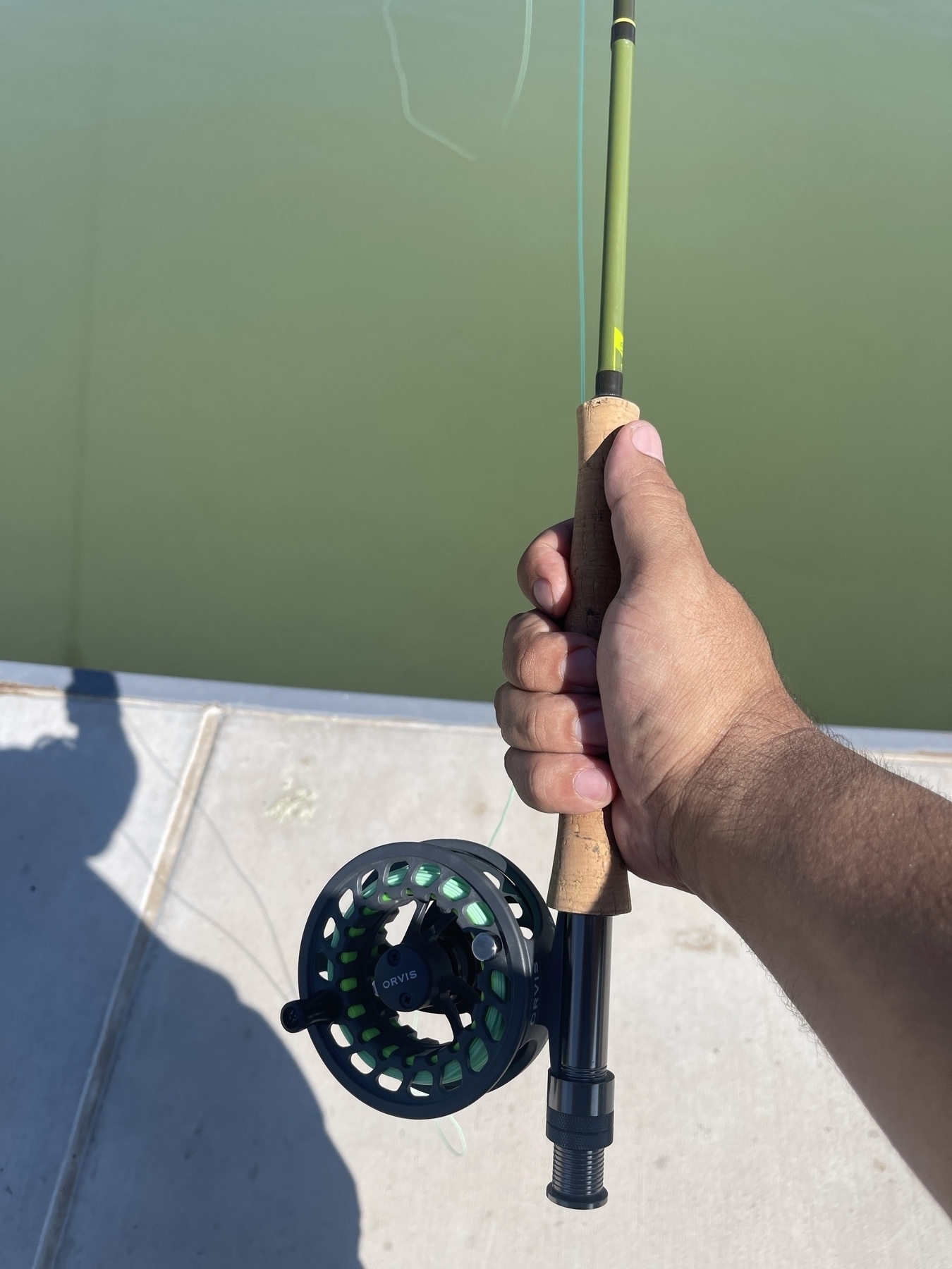 Close up photograph of a fly fishing rod and reel