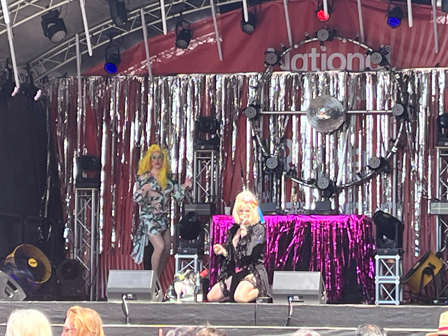 Drag queens performing on stage