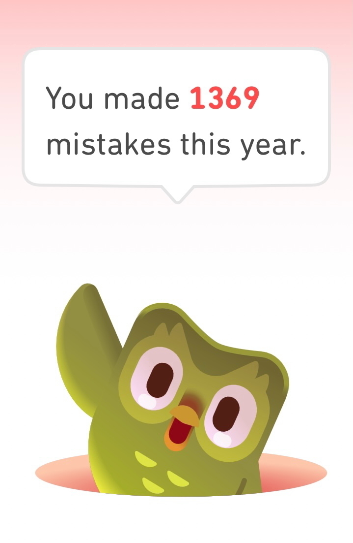 Auto-generated description: A cartoon owl with a speech bubble humorously points out that 1,369 mistakes were made this year.