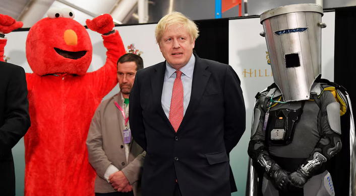 Boris Johnson standing next to other candidates including Elmo and Count Binface