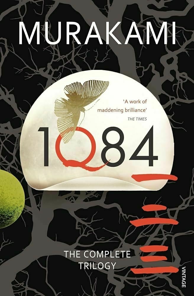 Cover of Haruki Murakami's book 1Q84: The Complete Trilogy featuring a butterfly and abstract design elements.