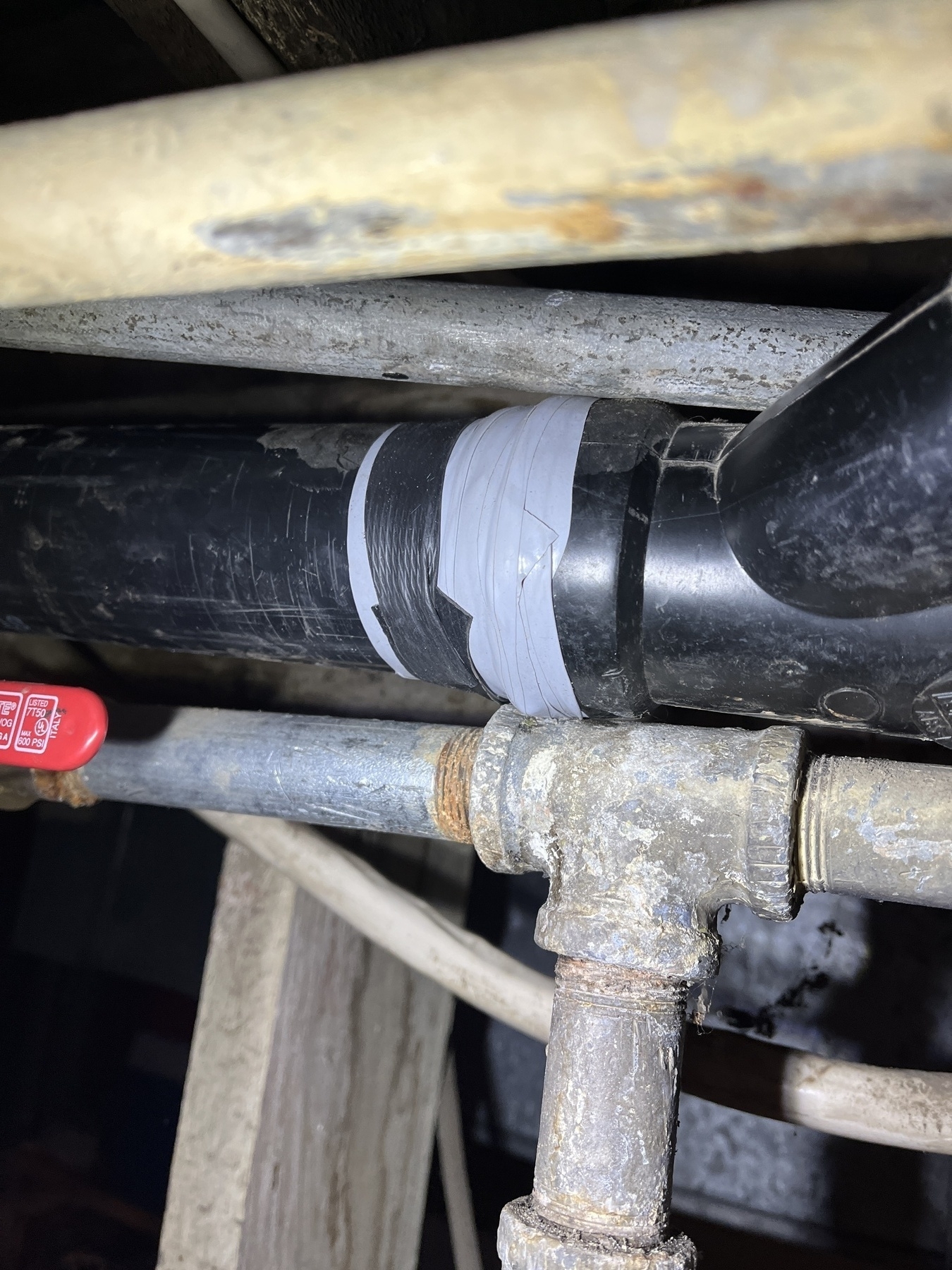 Drain pipe repaired with silicone tape 