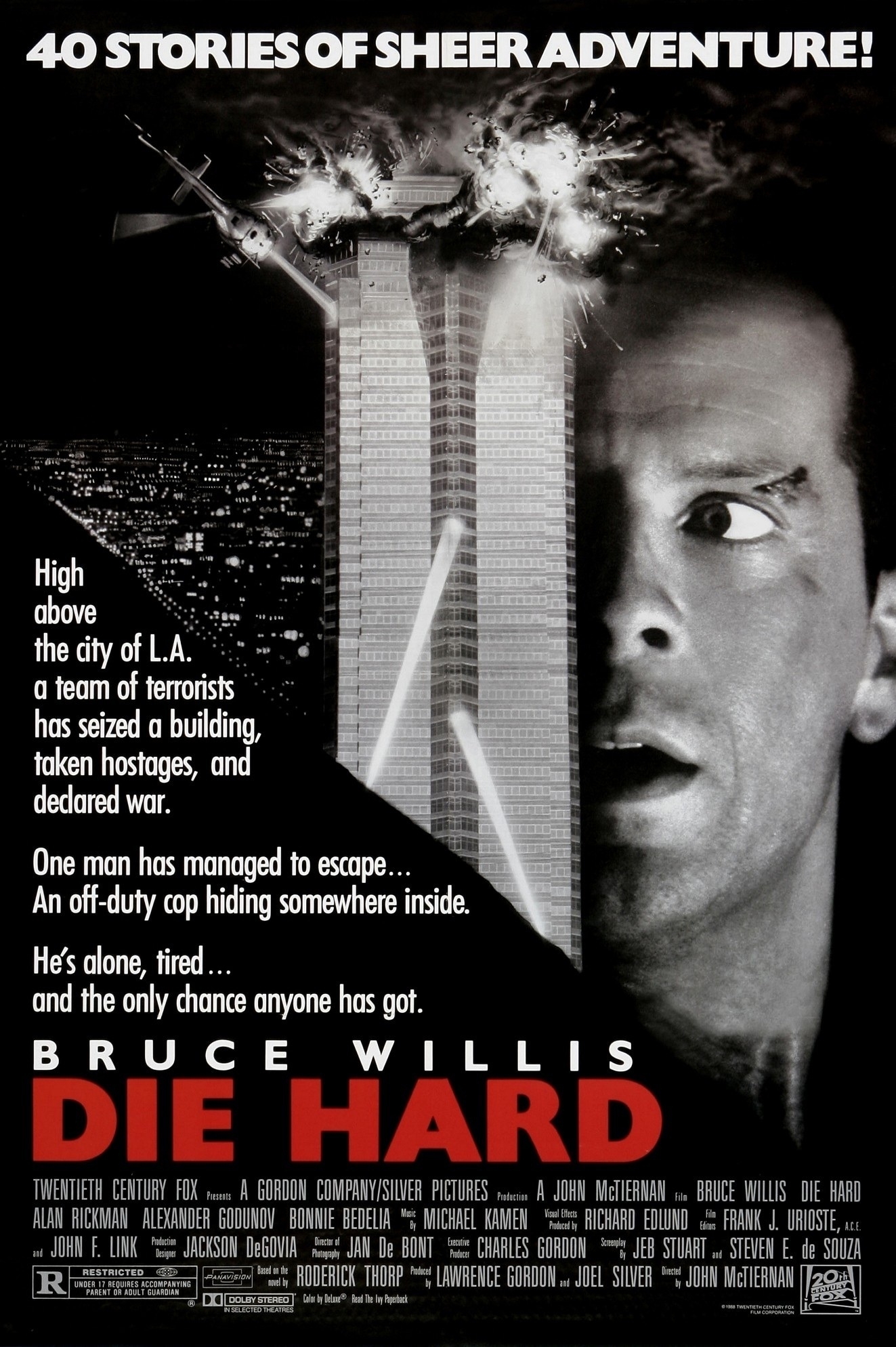 The cinema release poster for the movie Die Hard. A head shot of the actor Bruce Willis and a tall office building with flames exploding from the top floors.