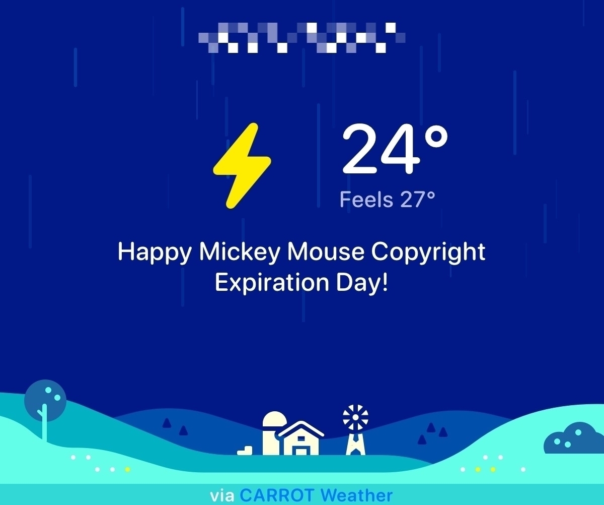 An image from the Carrot Weather app with a dark blue background and “Happy Mickey Mouse Copyright Expiration Day!” in white writing. The temperature is 24°C and Feels 27°. There is a yellow lightning bolt symbol denoting stormy weather.