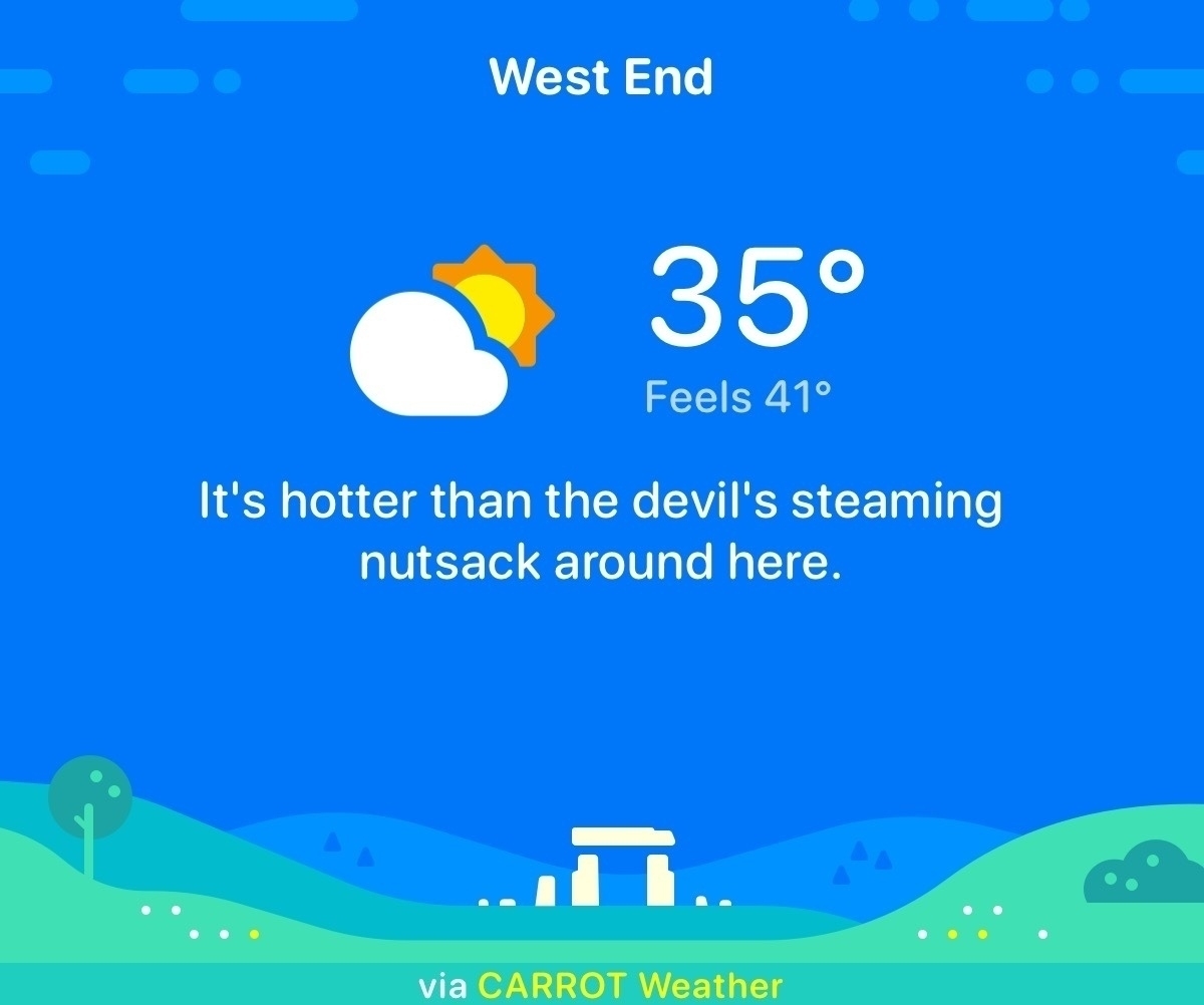 A screenshot from Carrot Weather App. Temp of 35°C with Feels 41°c. Underneath it says - It’s hotter than the devil’s steaming nutsack around here.