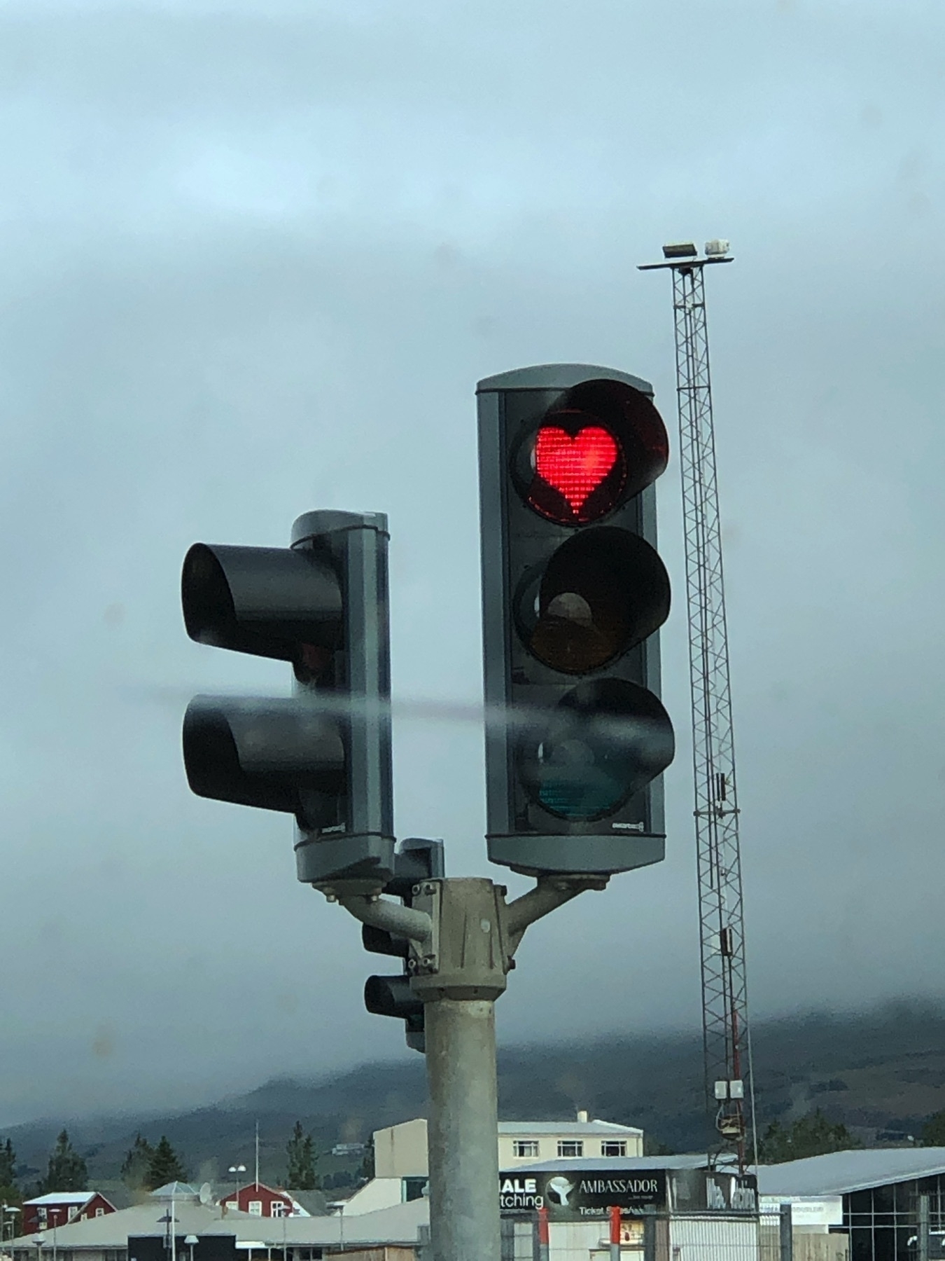 Heart shaped red light in an intersection stoplight