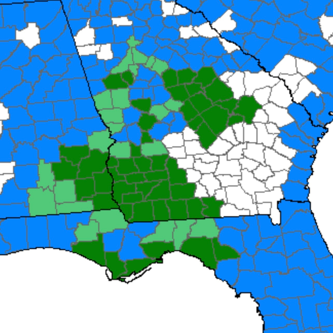 A map highlights certain counties in Alabama marked in dark green and light green, against a backdrop of blue, with white outlining remaining areas.