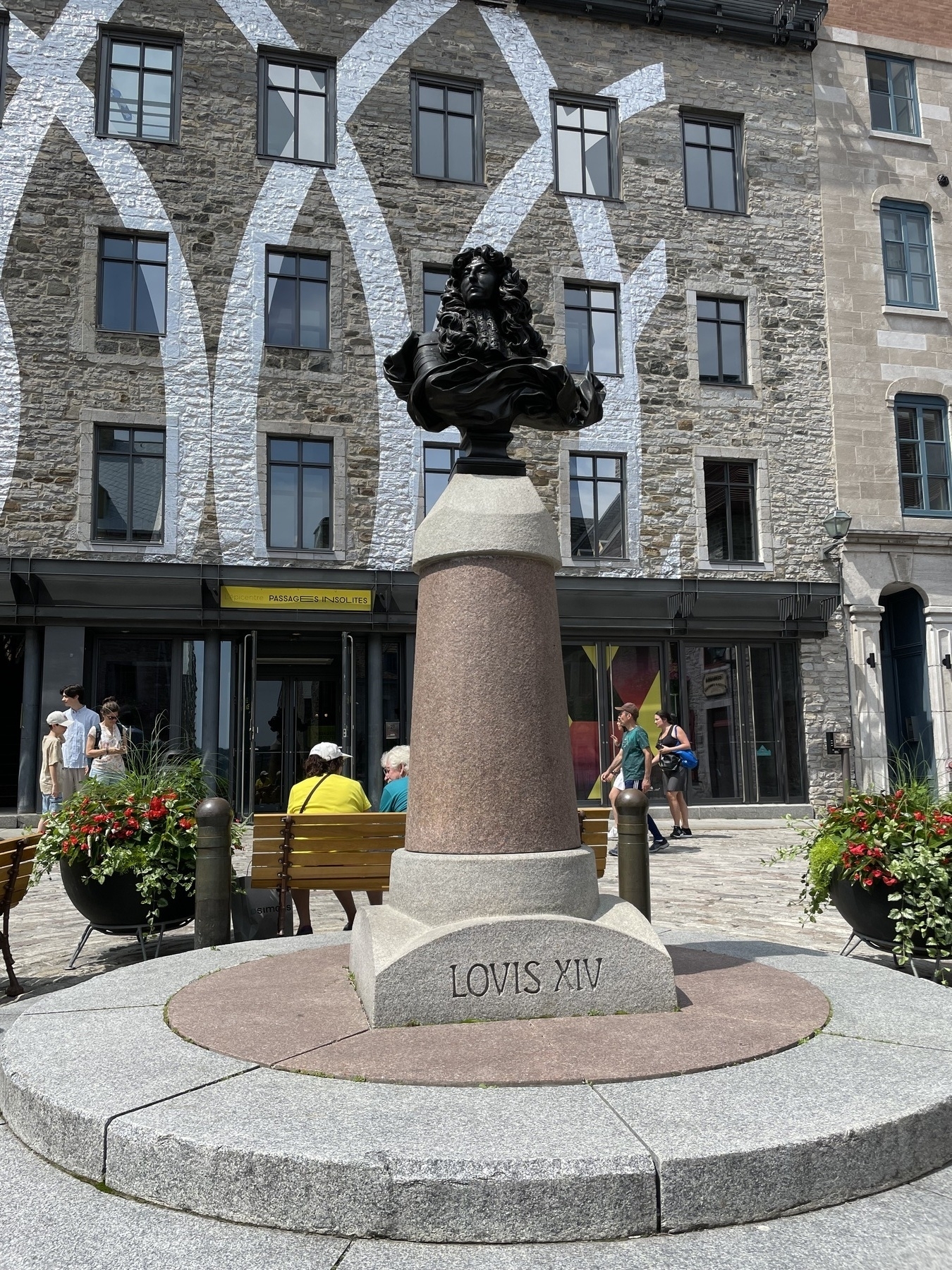 Mighty King Louis XIV a statue that sits in place royale, Quebec City
