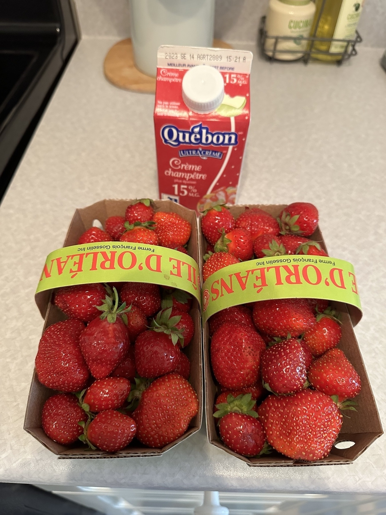 2 baskets of fresh picked local strawberries, Quebec City