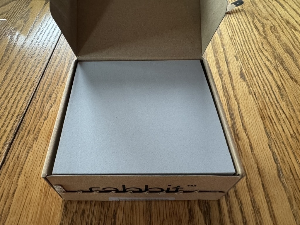 An open box with plain grey foam.