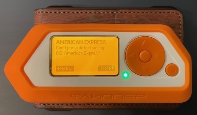 Now an American Express card is inside the wallet.