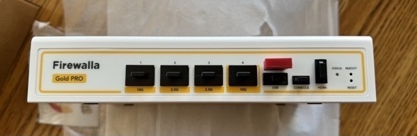 The front panel of a router with 2 10G ports and 2 2.5G ports