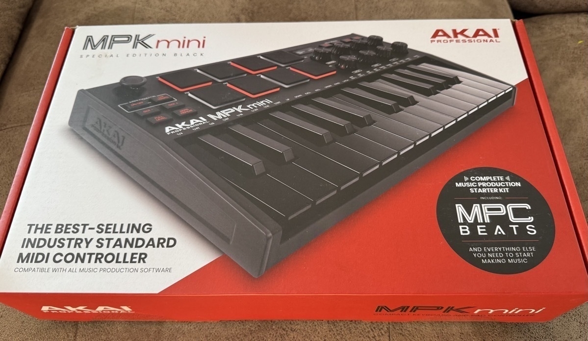 A boxed Akai MPK Mini mk3, in all black