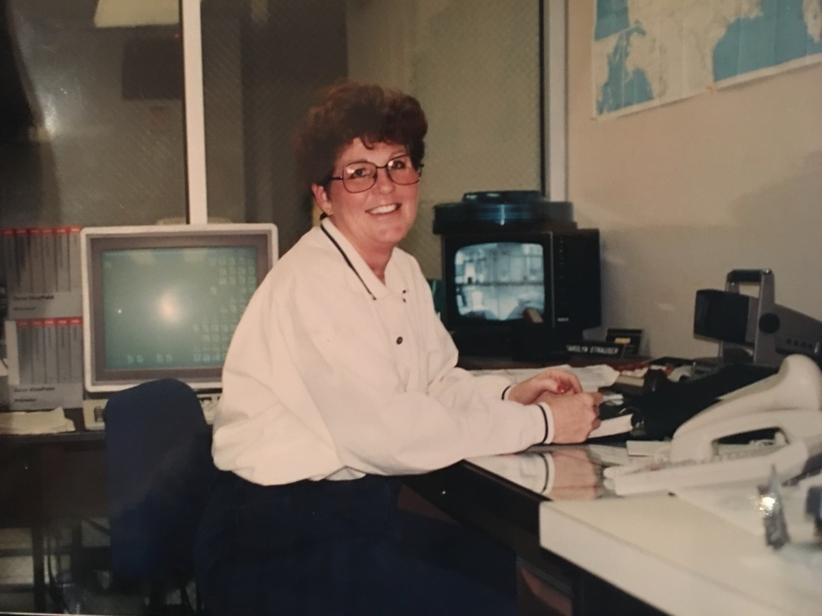 My mom at her desk at the railroad office, next to the Xerox Star GUI computer she was using in 1983, before the launch of the Macintosh.