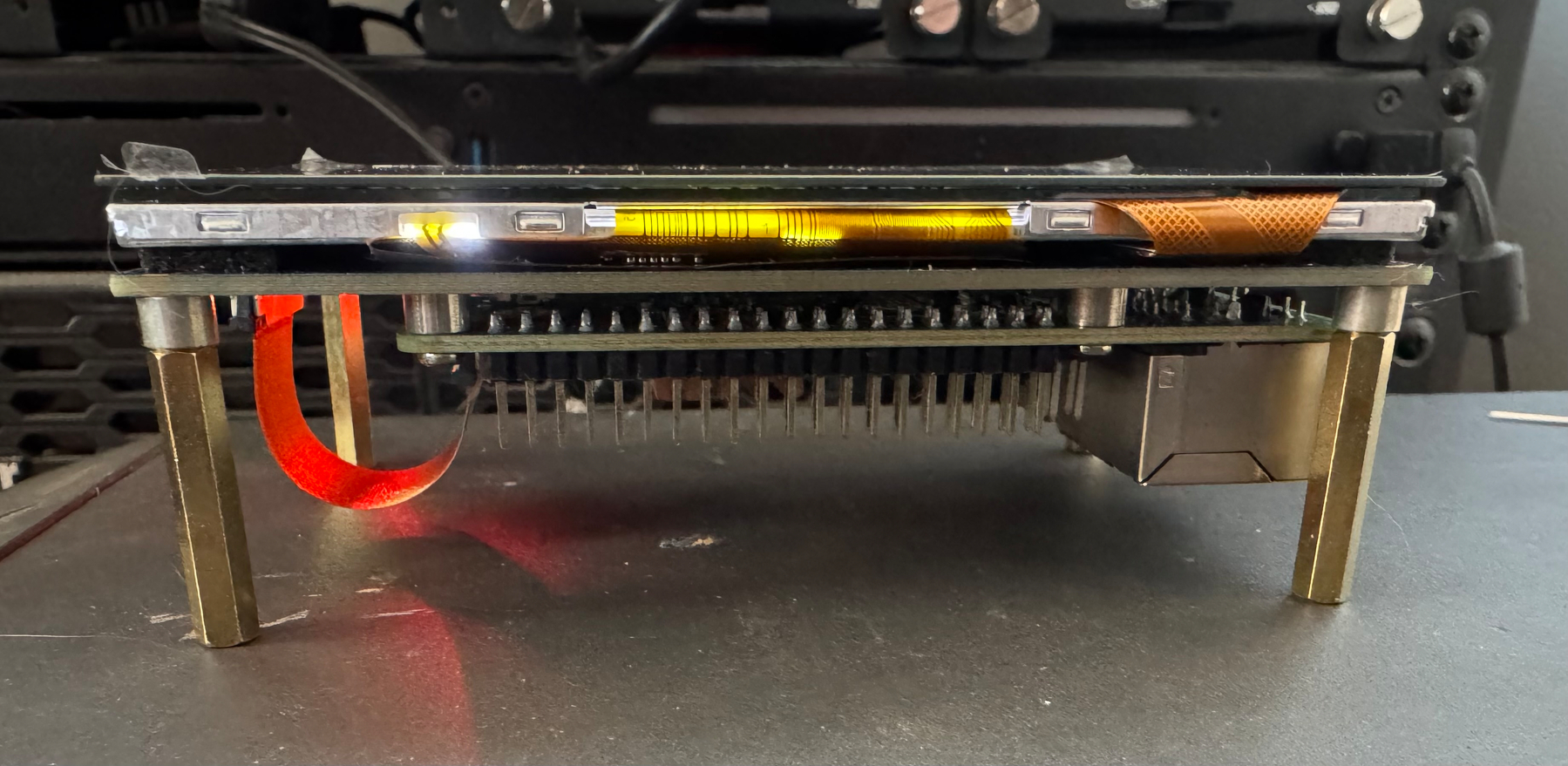 Side view of the screen with Raspberry Pi 4 mounted underneath it.