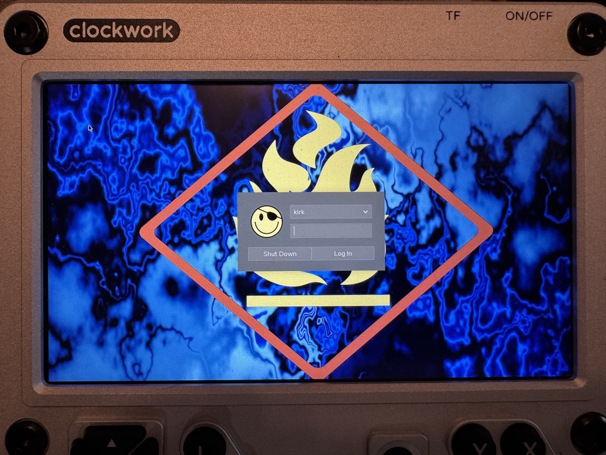The same image, but showing a username/password prompt. The icon is a yellow smiley with a black patch over one eye.